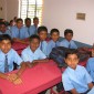 Students seated at New Desks Donated by HMCT Mysore at Government High School, Hebbal
